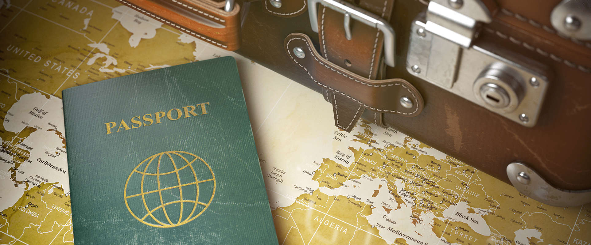 Vintage suitcase and passport.